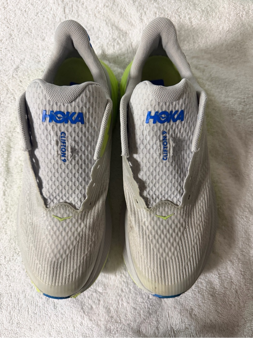 Hoka Boys Athletic Shoes in Light Gray with Blue and Neon Yellow Accents